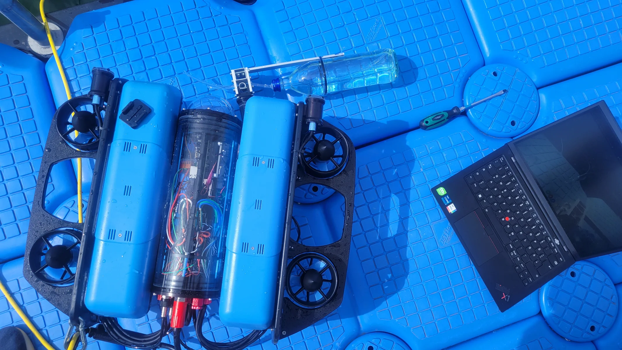 Environmental diving robot with a collected water sample.